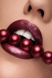 sexy pearl necklace between lips