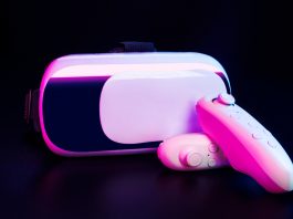 Virtual reality headset and controllers representing interactive sex toys and digital intimacy technology