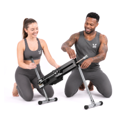 Thumpr A3 PRO sex machine held by man and woman models in stock photo with white background