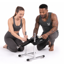 Thumpr A6 COMPACT sex machine held by man and woman models in stock photo with white background