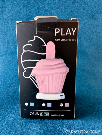 Back of the GITM Playbook Cupcake Vibrator box showing the available pink and blue colour options and safety compliance markings