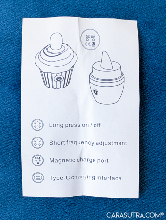 GITM Playbook Cupcake Vibrator user manual page showing operation instructions: long press for on and off, short press for frequency adjustment, magnetic charge port and Type-C charging interface