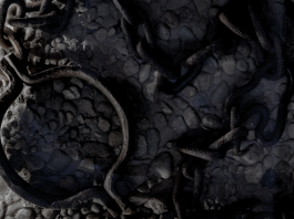 Rusted iron shackle and tangled chains on cold stone floor, cool-toned close-up