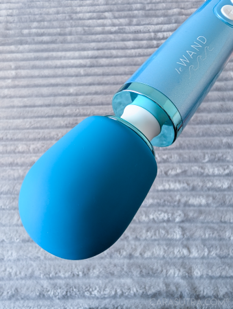 Close-up of the Le Wand Dive silicone head and flexible neck, showing the white collar joint between head and body