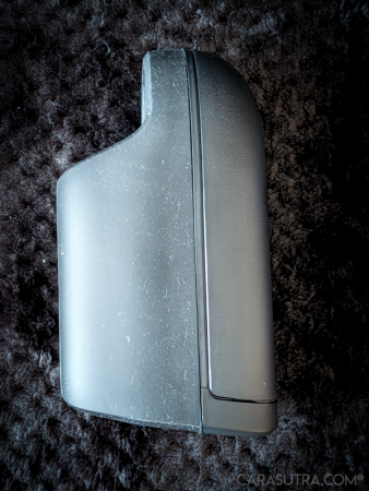 Arcwave Ion 2 laid on a black blanket, side profile of the full device