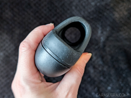 Arcwave Ion 2 tilted in hand to reveal the internal silicone sleeve and opening