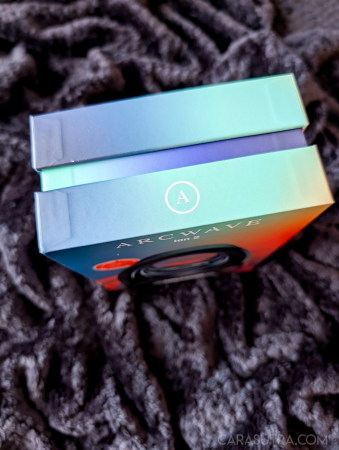 Arcwave Ion 2 retail box on its side showing the Arcwave branding and iridescent packaging
