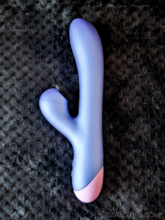 The ROMP Pulse Rabbit laid flat, showing the back of the shaft and clitoral arm