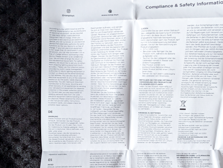 The ROMP Pulse Compliance & Safety Information leaflet unfolded, showing multilingual safety text