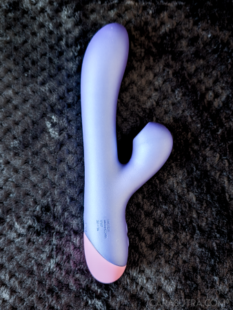 The ROMP Pulse Rabbit Vibrator laid flat, showing the front of its dual-arm design